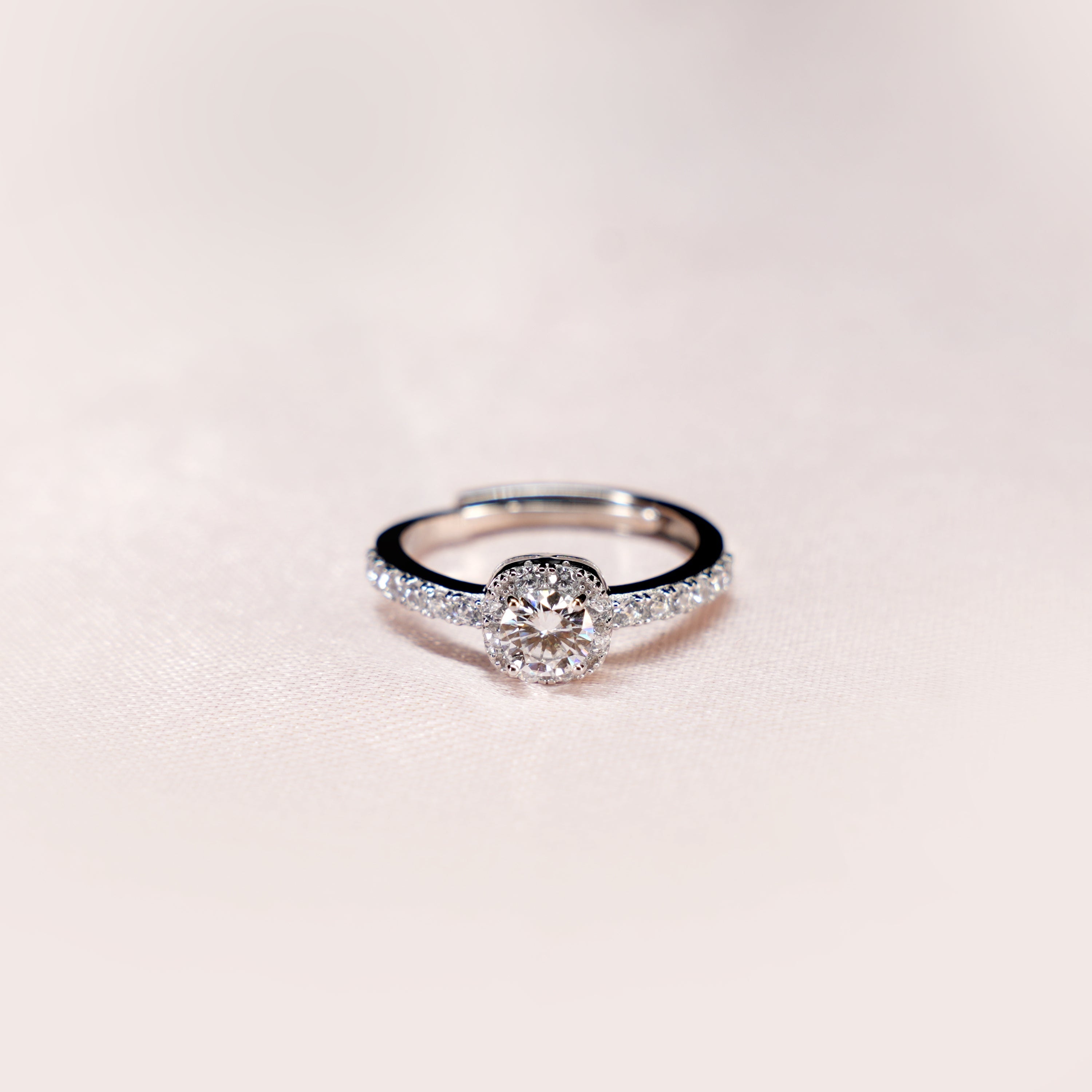 Round Halo Pavé Solitaire Ring