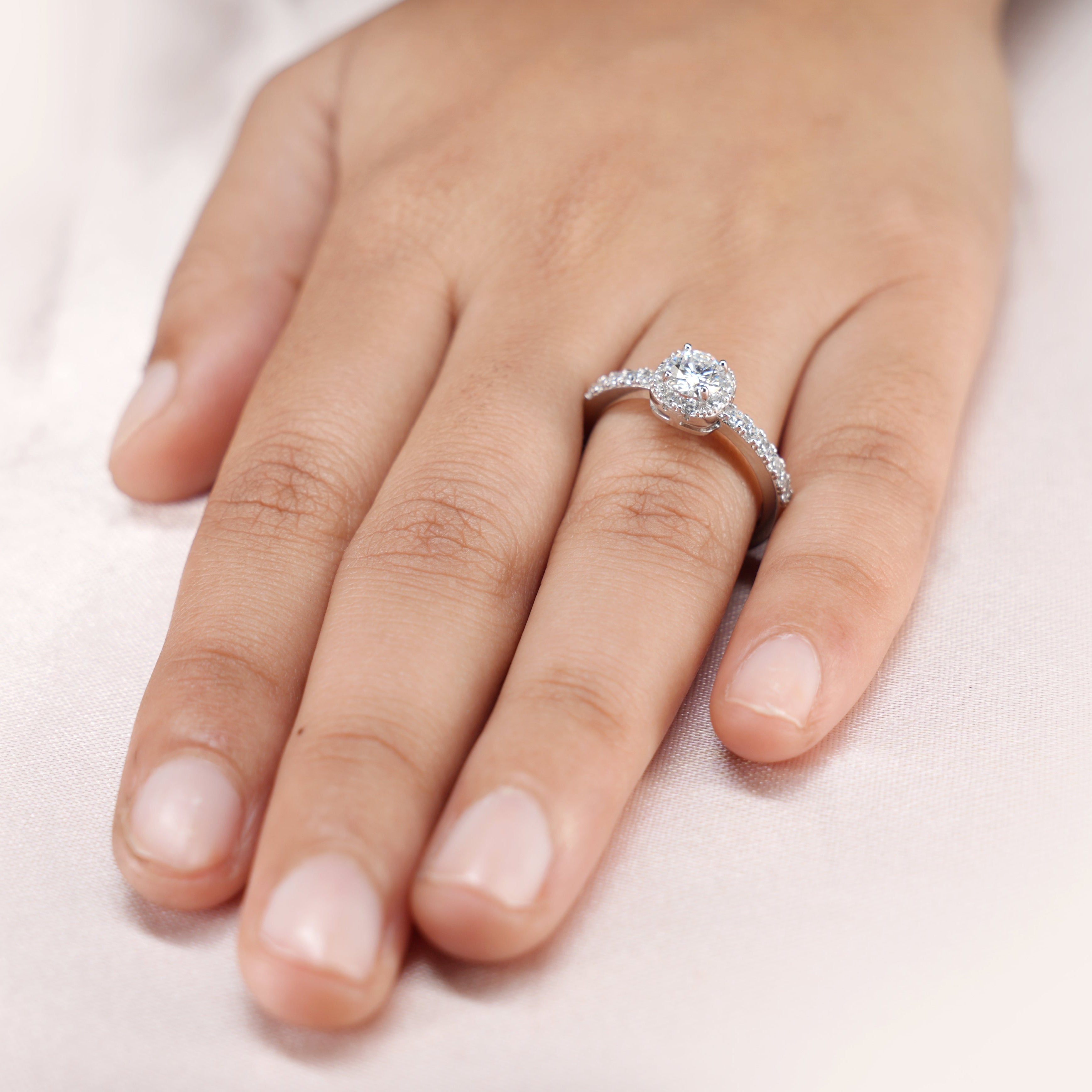 Round Halo Pavé Solitaire Ring