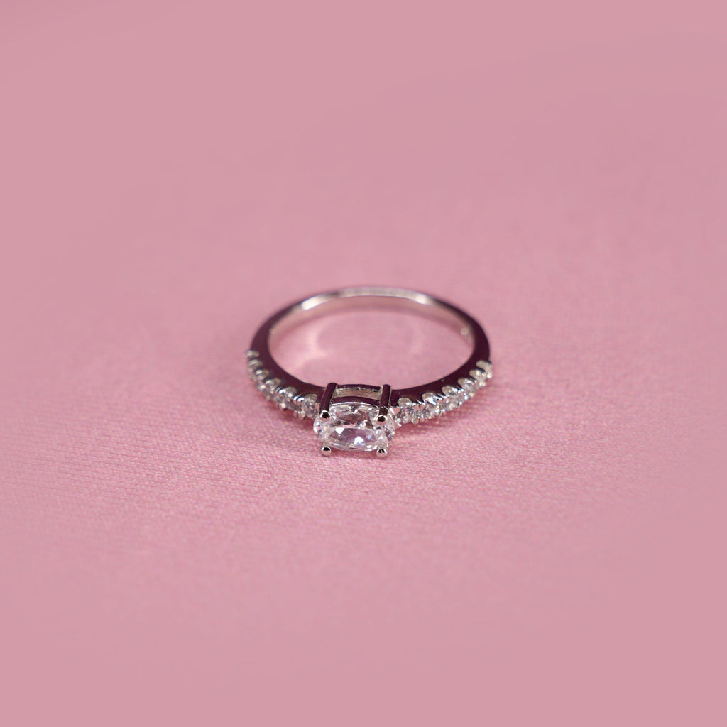 Oval Solitaire Graduating Pavé Ring