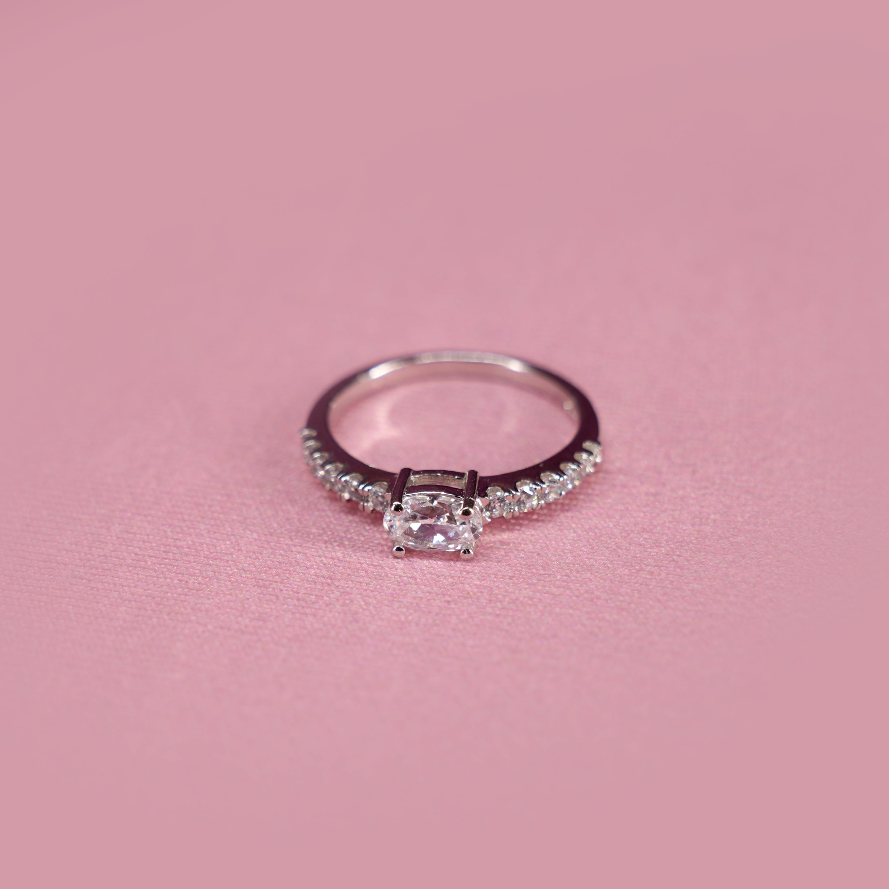Oval Solitaire Graduating Pavé Ring