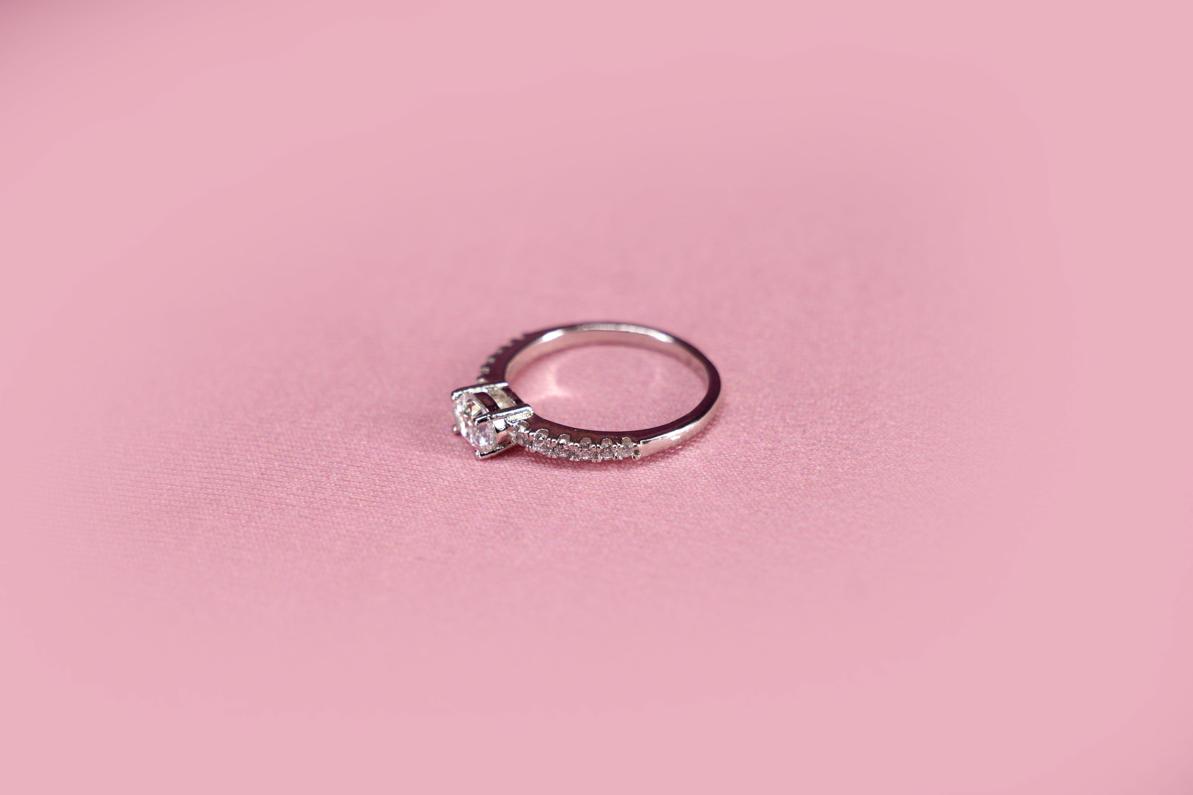 Oval Solitaire Graduating Pavé Ring