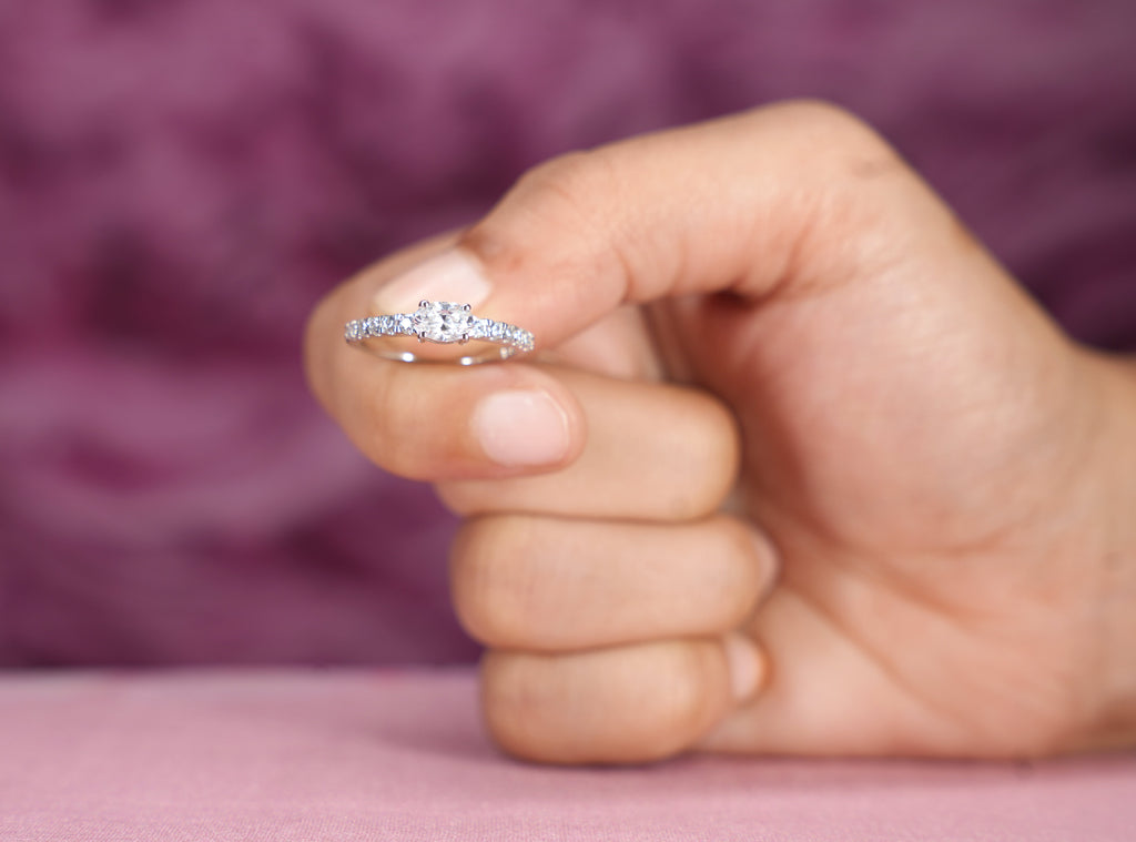 Oval Solitaire Graduating Pavé Ring